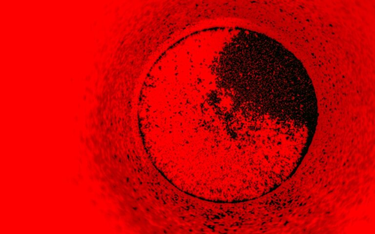 Um Fundo Vermelho Texturizado Com Formato Circular Escuro Q4zAwVcUDNc