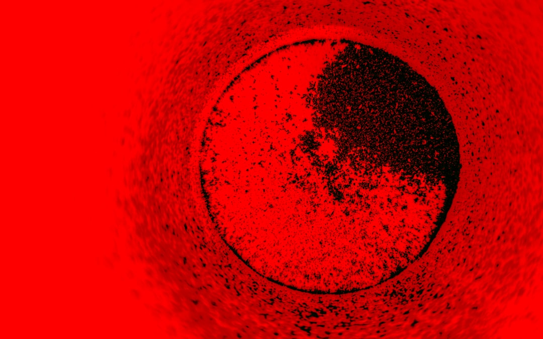Um Fundo Vermelho Texturizado Com Formato Circular Escuro Q4zAwVcUDNc