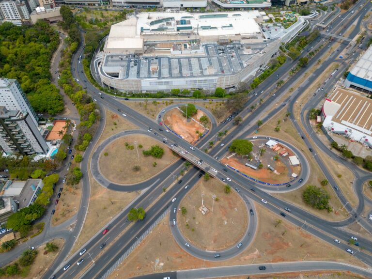 Aerial shot of a modern city intersection in Belo Horizonte, showcasing urban architecture and landscape.