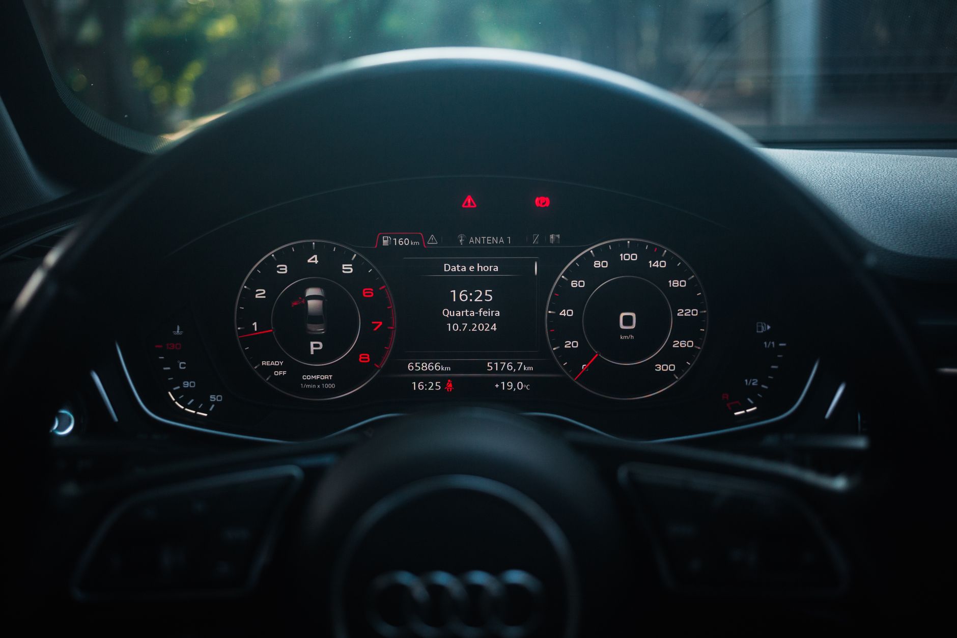 Dynamic shot of a modern car dashboard featuring a digital display and sleek design.